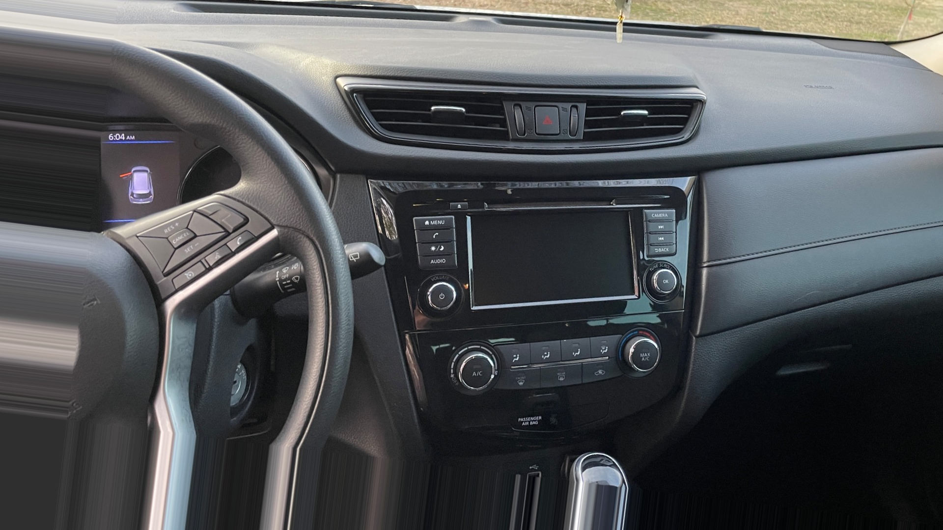 Clean Nissan dashboard and center console after detailing